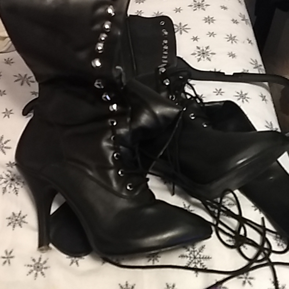 Calf high black lace up boots